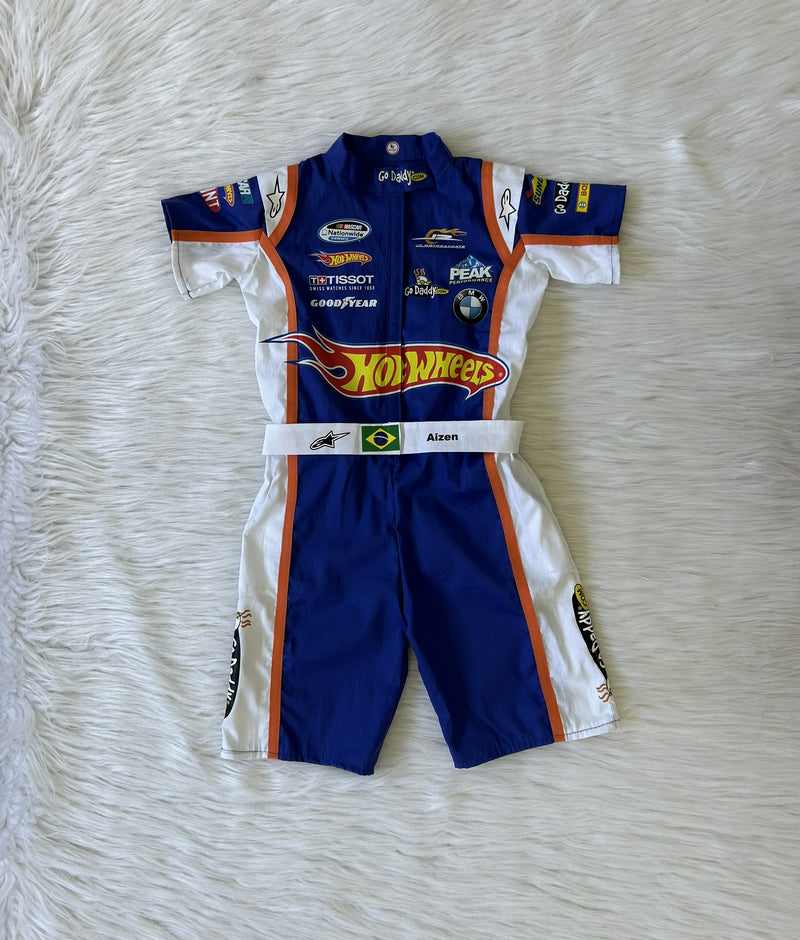 Macacão hotwheels Nascar com viés laranja curto infantil