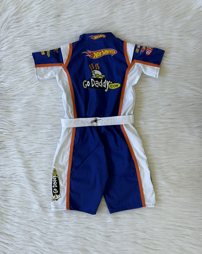 Macacão hotwheels Nascar com viés laranja curto infantil